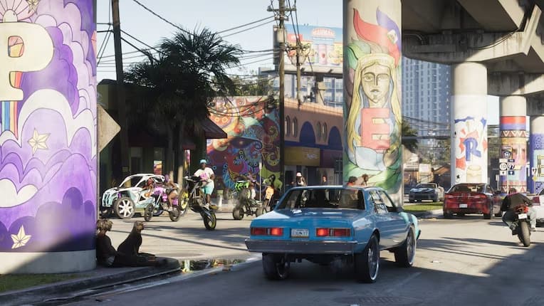 Strada di Vice City con murales e lowrider in GTA VI